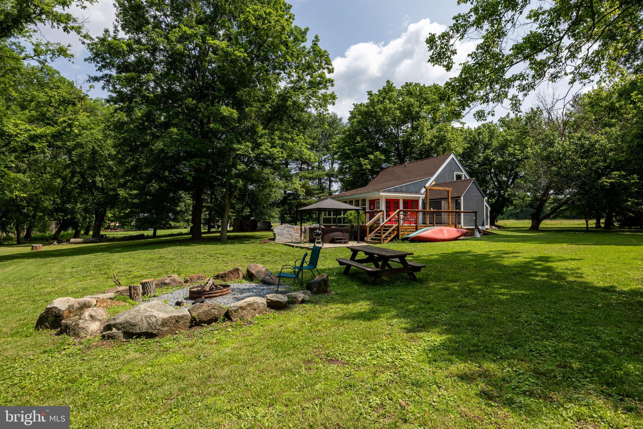 1215 Fort Stover Road Luray, VA 22835 - Photo 121 of 143 a view of a house with a yard porch and sitting area