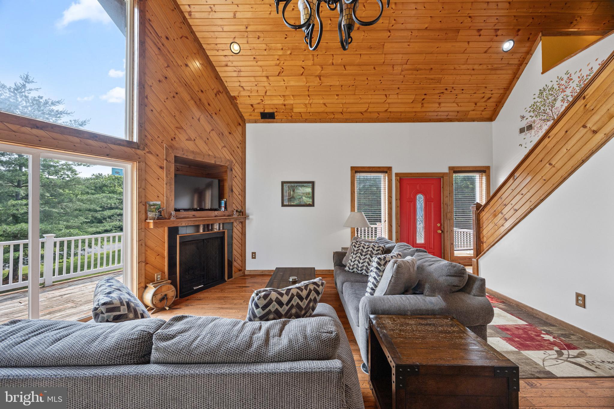 1215 Fort Stover Road Luray, VA 22835 - Photo 13 of 143 a living room with furniture and a fireplace