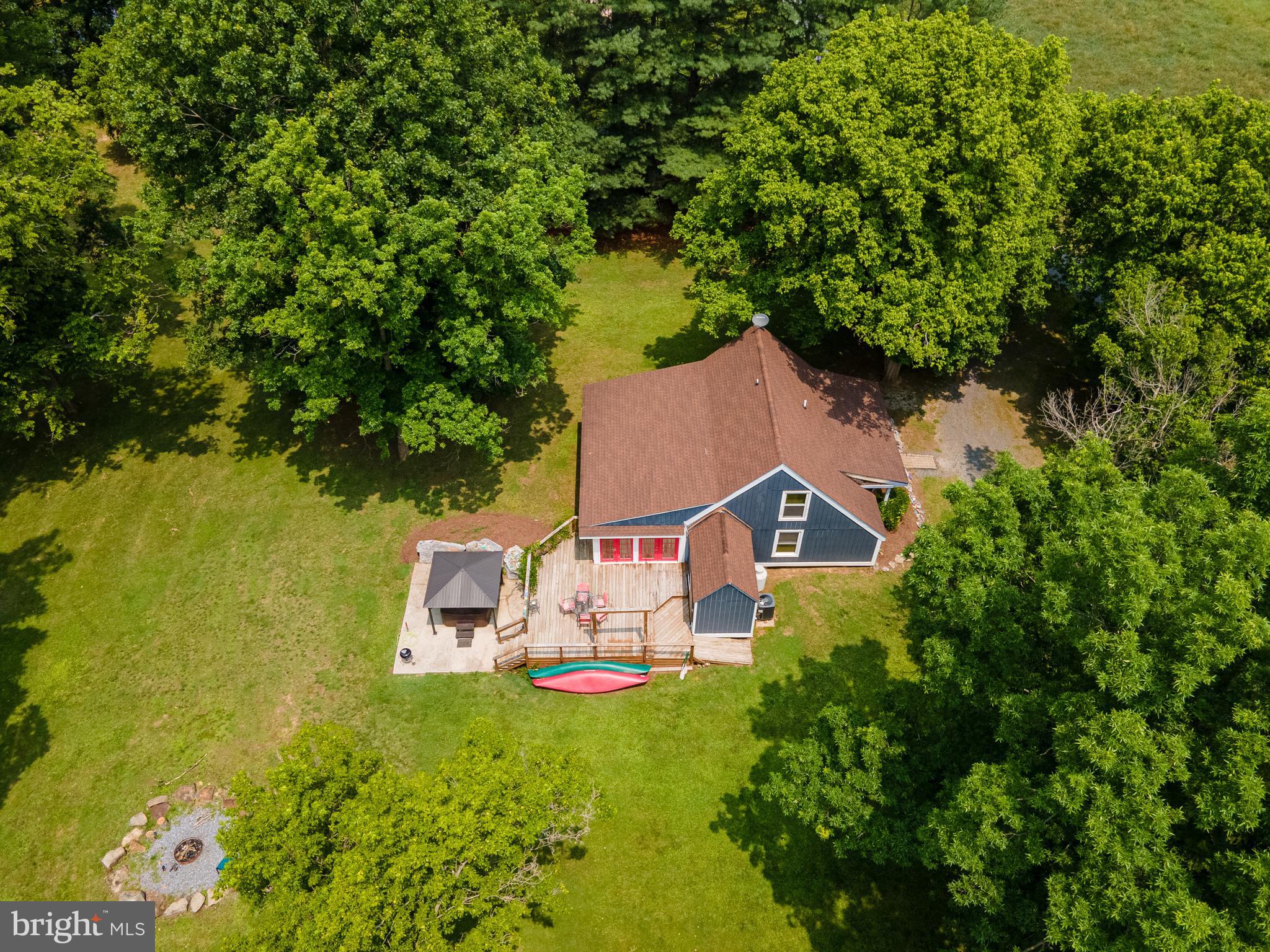 1215 Fort Stover Road Luray, VA 22835 - Photo 132 of 143 an aerial view of a house with swimming pool and garden view