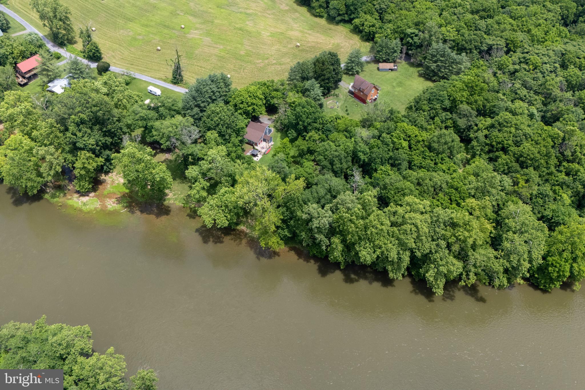 1215 Fort Stover Road Luray, VA 22835 - Photo 142 of 143 an aerial view of a house with a yard and lake view