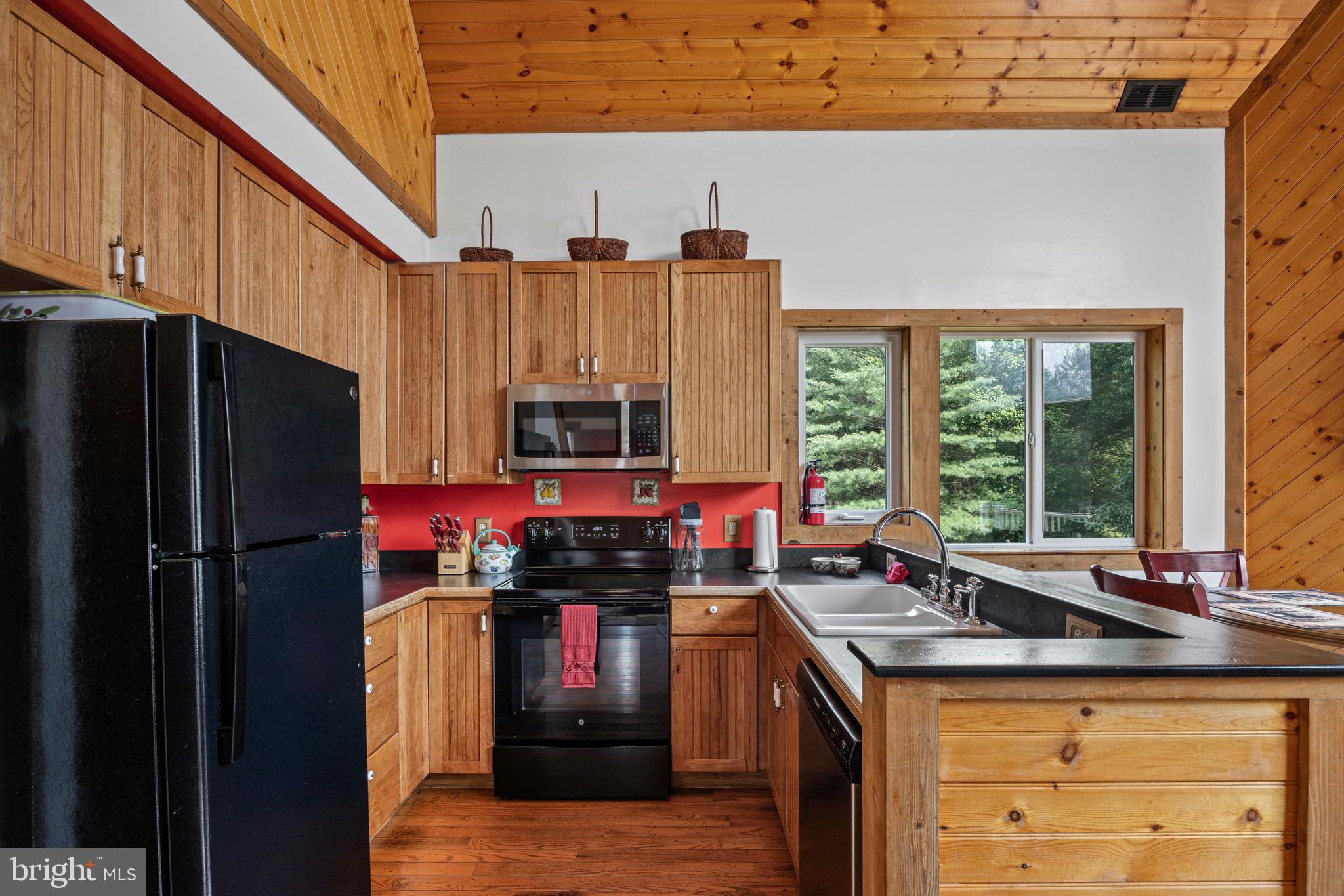 1215 Fort Stover Road Luray, VA 22835 - Photo 24 of 143 a kitchen with stainless steel appliances a sink stove and refrigerator