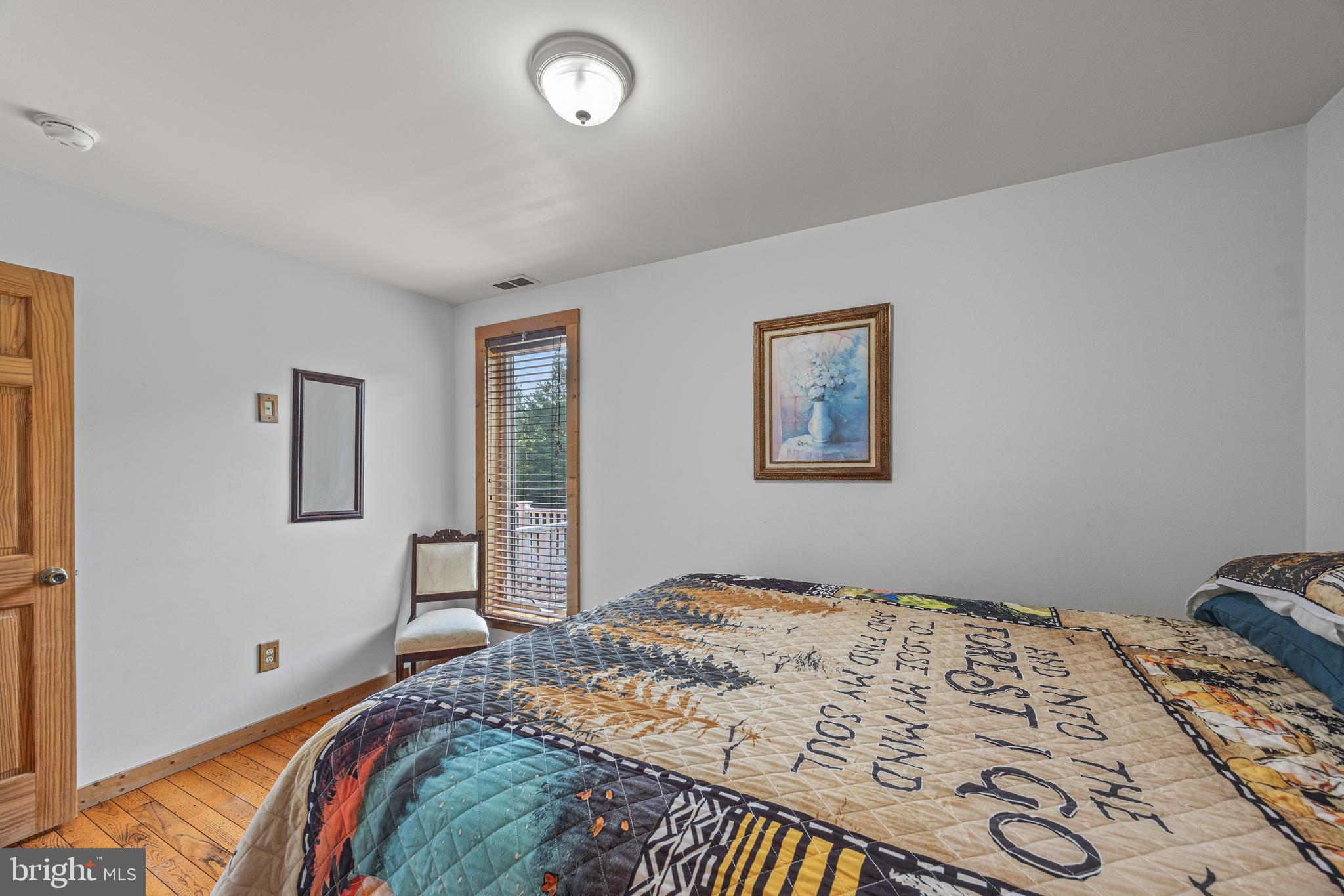 1215 Fort Stover Road Luray, VA 22835 - Photo 36 of 143 a bedroom with bed and a window
