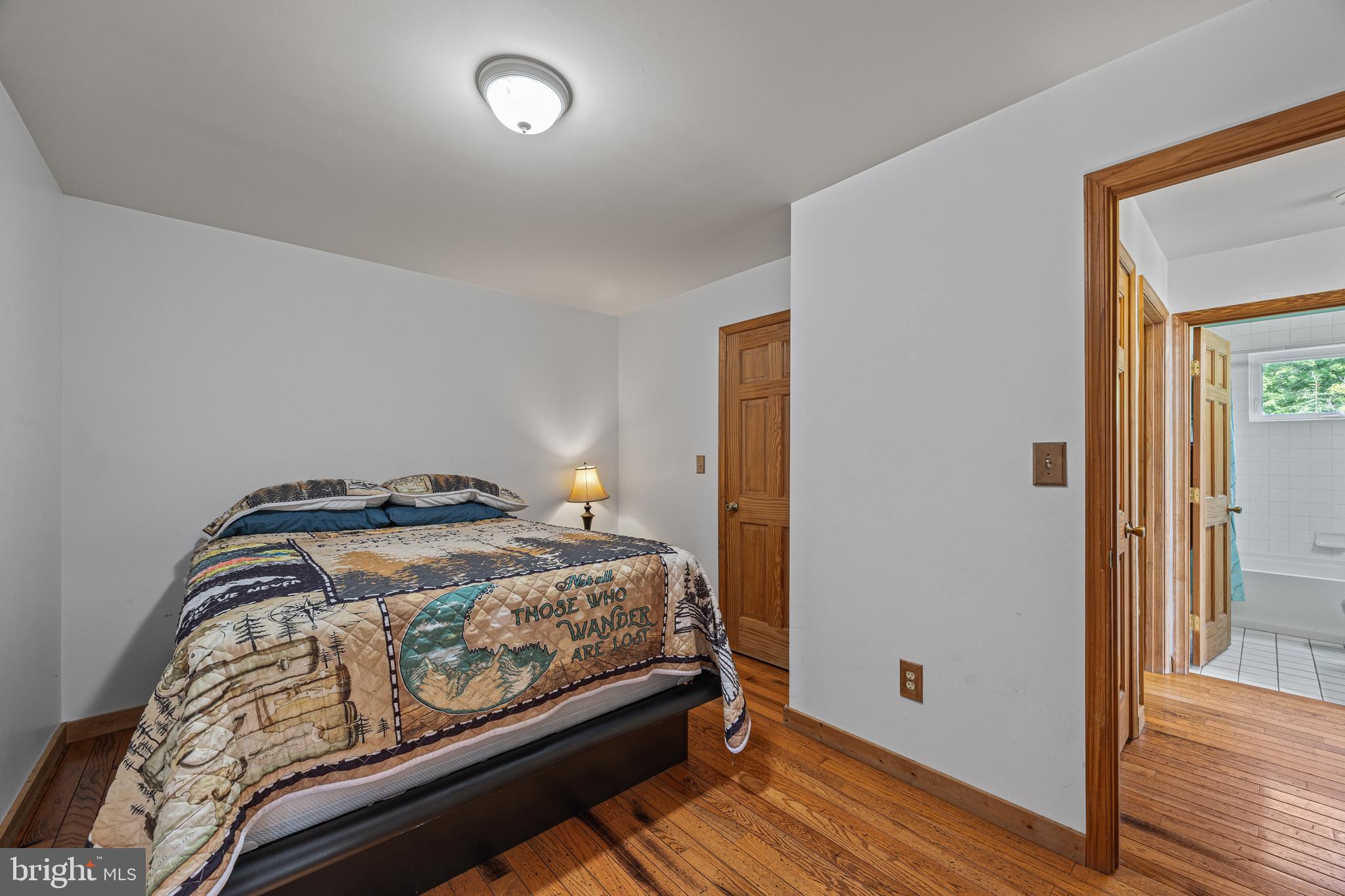 1215 Fort Stover Road Luray, VA 22835 - Photo 37 of 143 a bedroom with bed and wooden floor