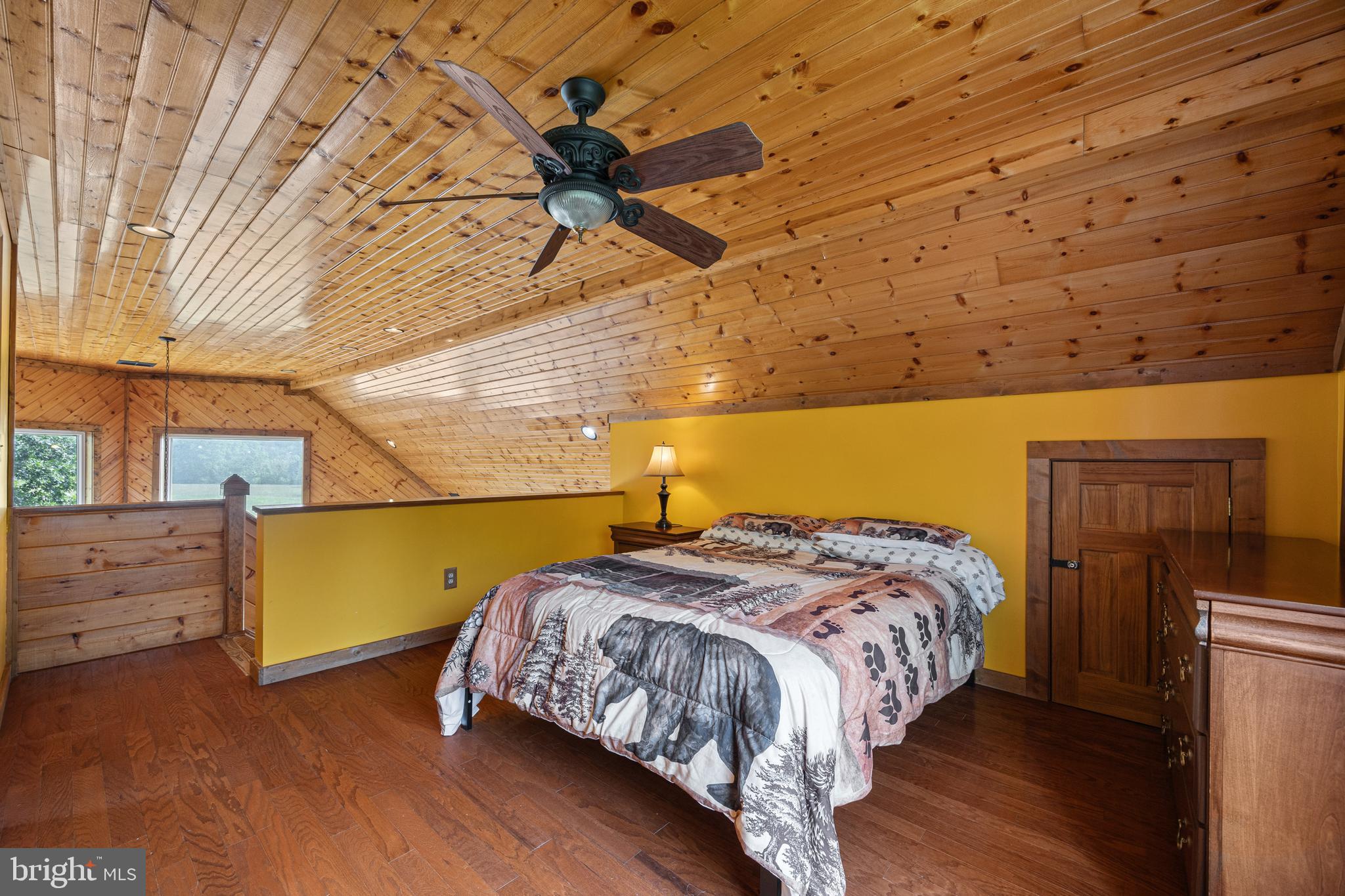 1215 Fort Stover Road Luray, VA 22835 - Photo 42 of 143 a bedroom with a bed and wooden floor