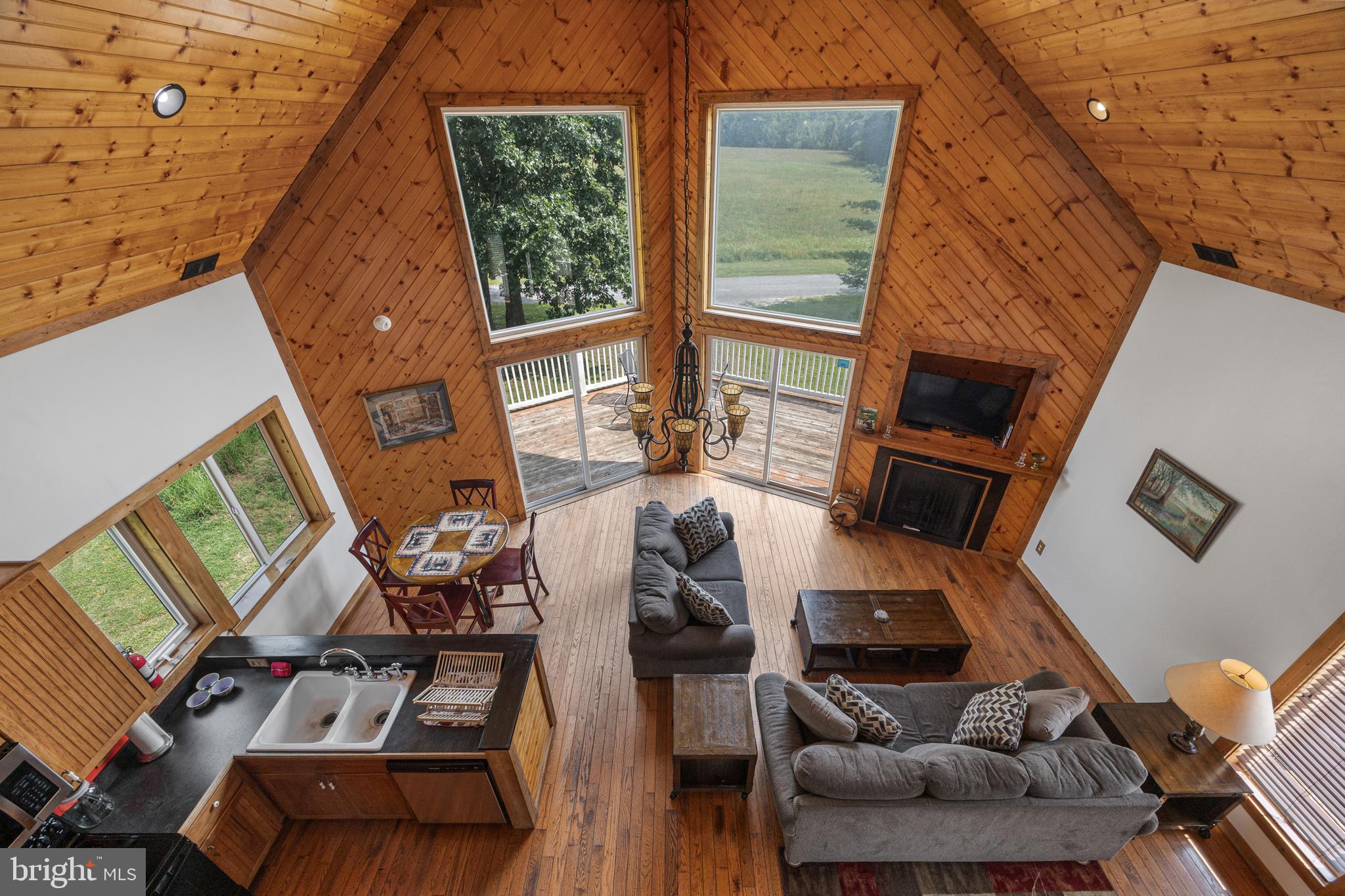 1215 Fort Stover Road Luray, VA 22835 - Photo 47 of 143 a view of living room with furniture and floor to ceiling window