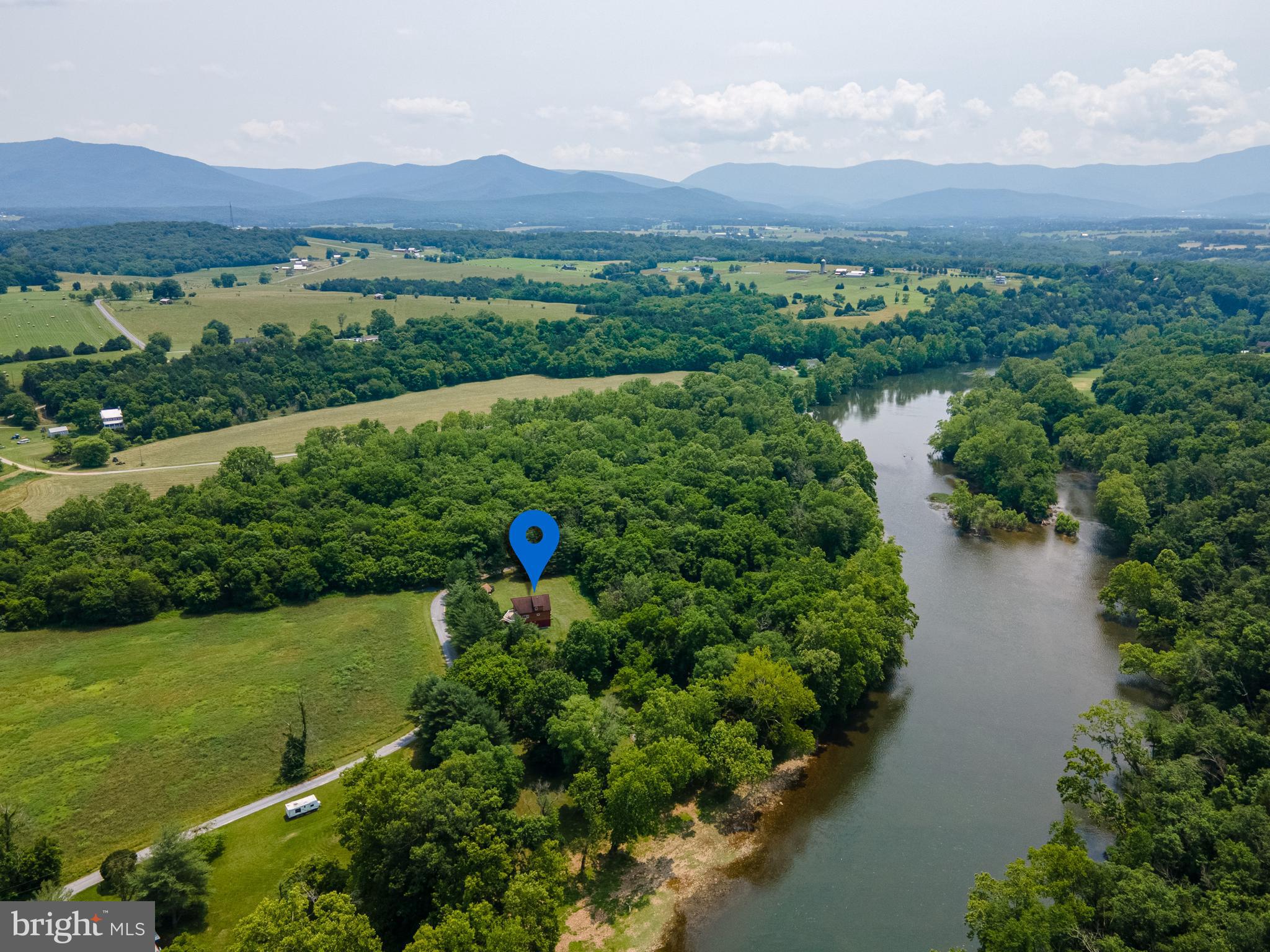 1215 Fort Stover Road Luray, VA 22835 - Photo 73 of 143 a view of a lush green field with a house in the background