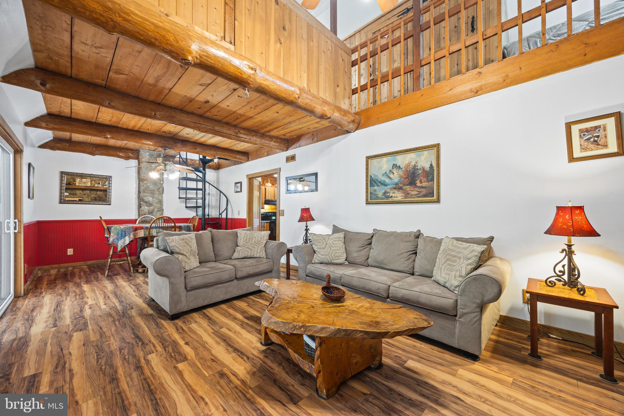 1215 Fort Stover Road Luray, VA 22835 - Photo 97 of 143 a living room with furniture and a wooden floor