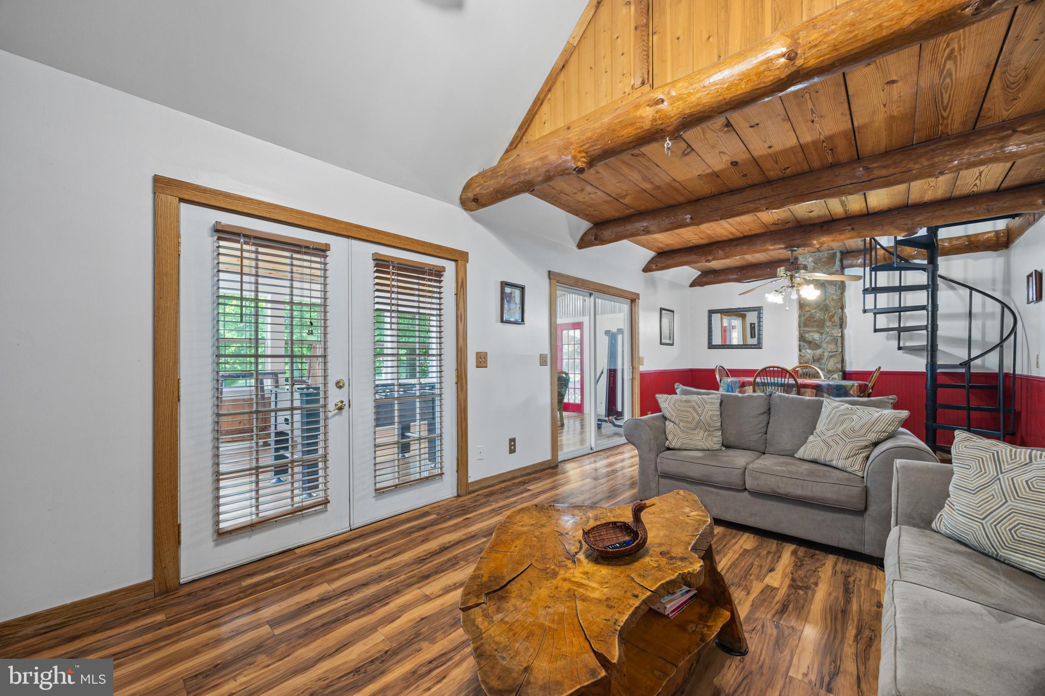 1215 Fort Stover Road Luray, VA 22835 - Photo 99 of 143 a living room with furniture and a wooden floor