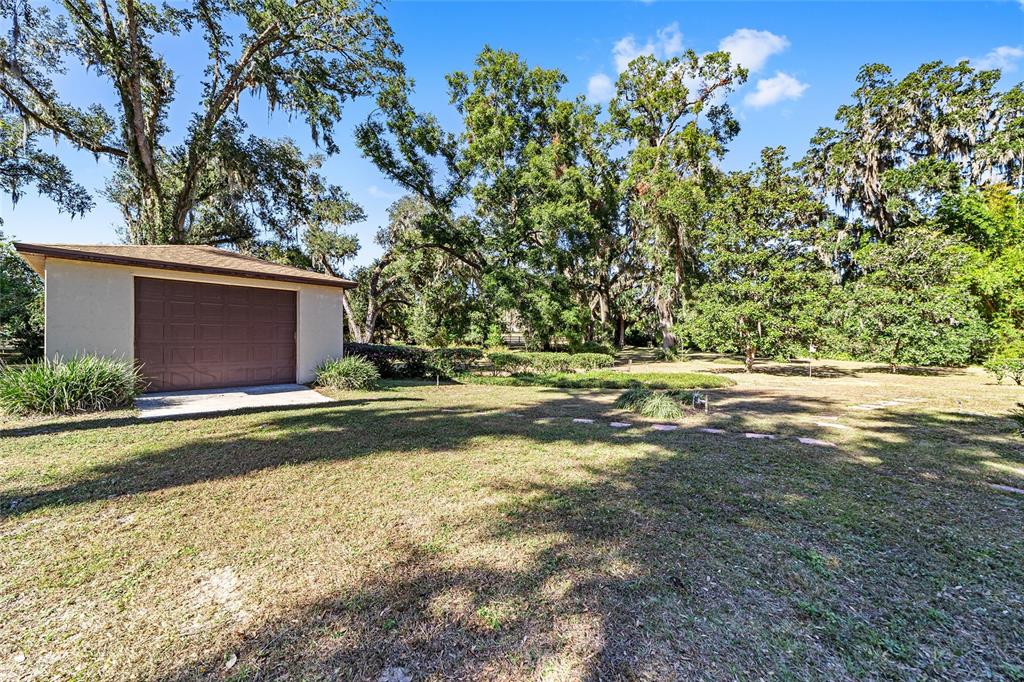 3590 Southwest 24th Avenue Road Ocala, FL 34471 - Photo 47 of 76 Fully Detached Garage for more parking, storage, boat, etc. Or... Convert into Mother In Law Quarters.