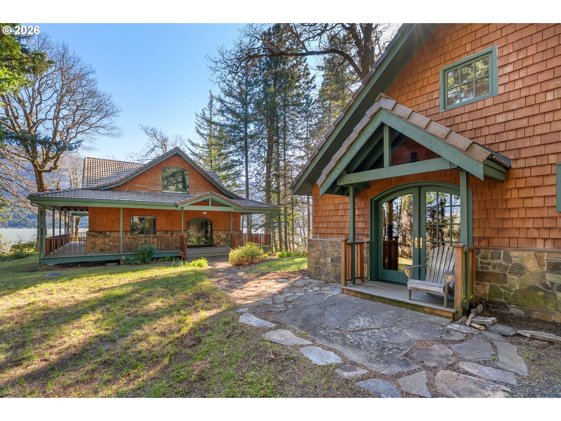 47742 Highway 14 Stevenson, WA 98648 - Photo 1 of 48 a front view of a house with garden