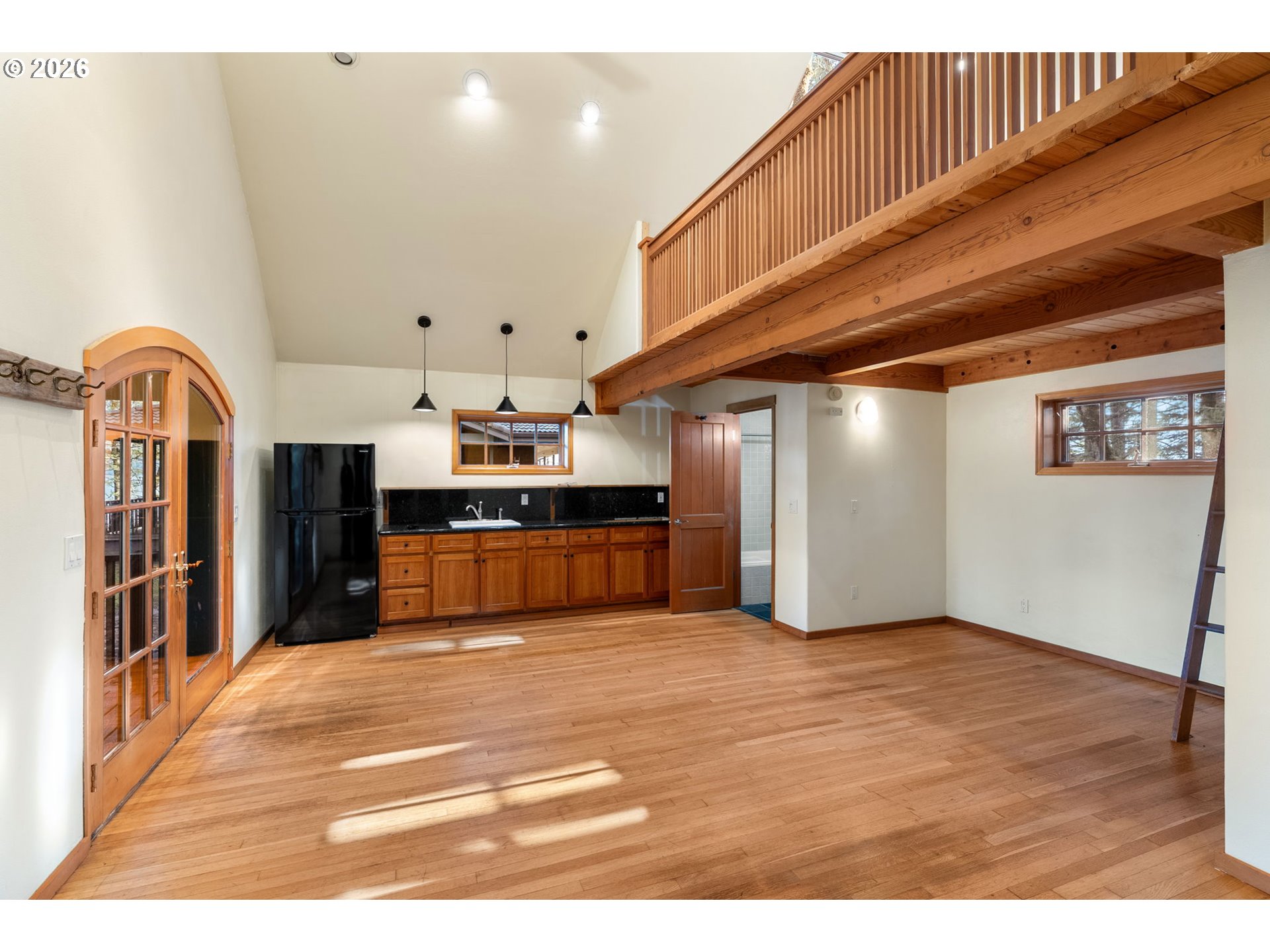 47742 Highway 14 Stevenson, WA 98648 - Photo 30 of 48 a view of kitchen with cabinets and wooden floor