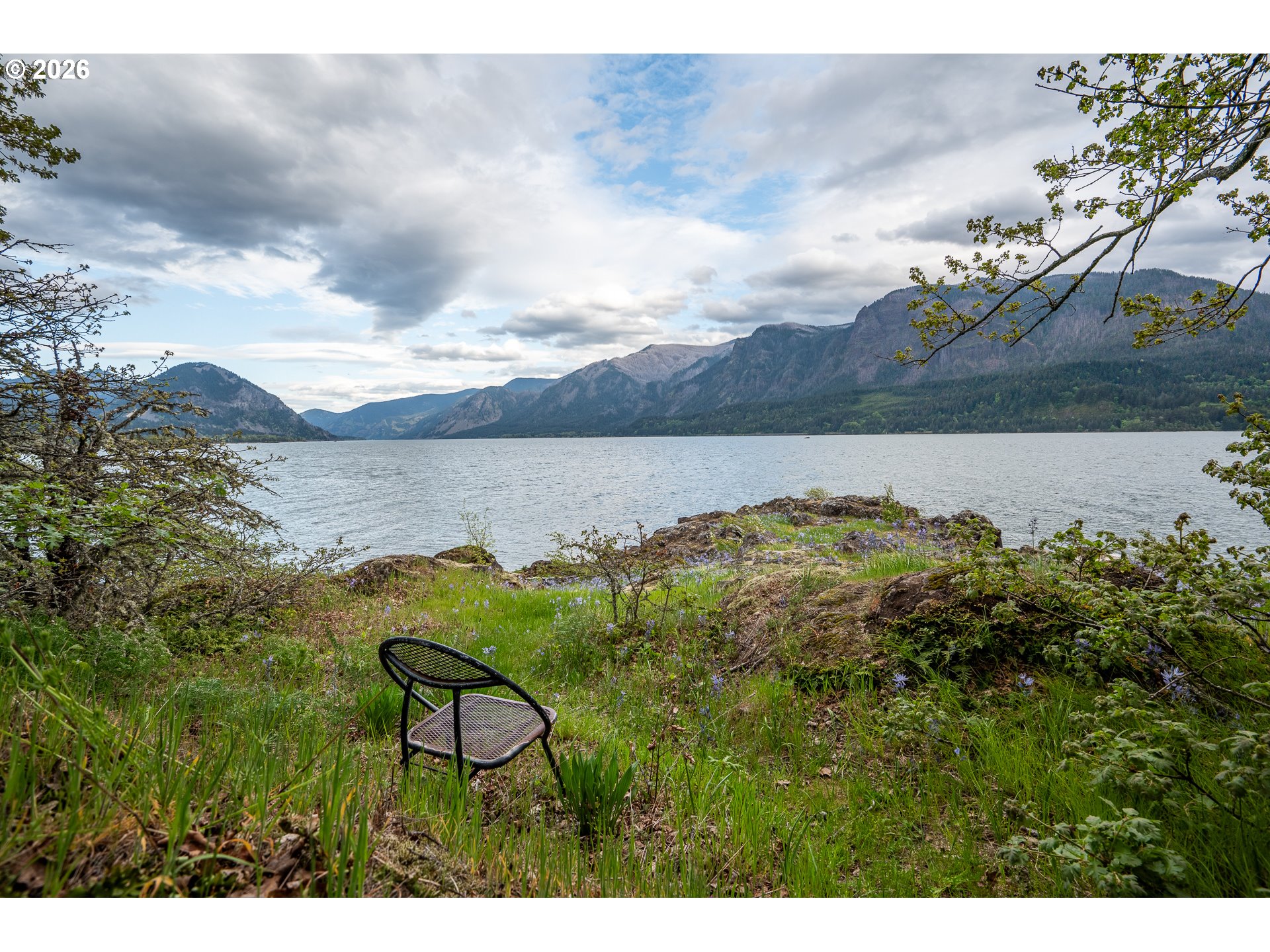 47742 Highway 14 Stevenson, WA 98648 - Photo 6 of 48 a view of a lake with a mountain