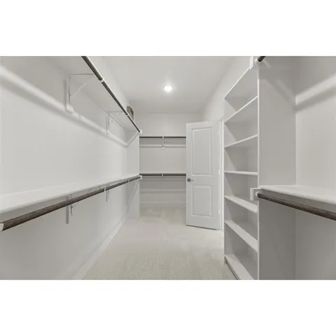 a view of a livingroom with a ceiling fan