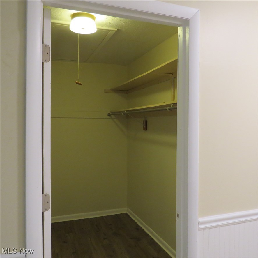 430 High Meadow Road Amherst, OH 44001 - Photo 25 of 29 Spacious closet with dark hardwood / wood-style flooring