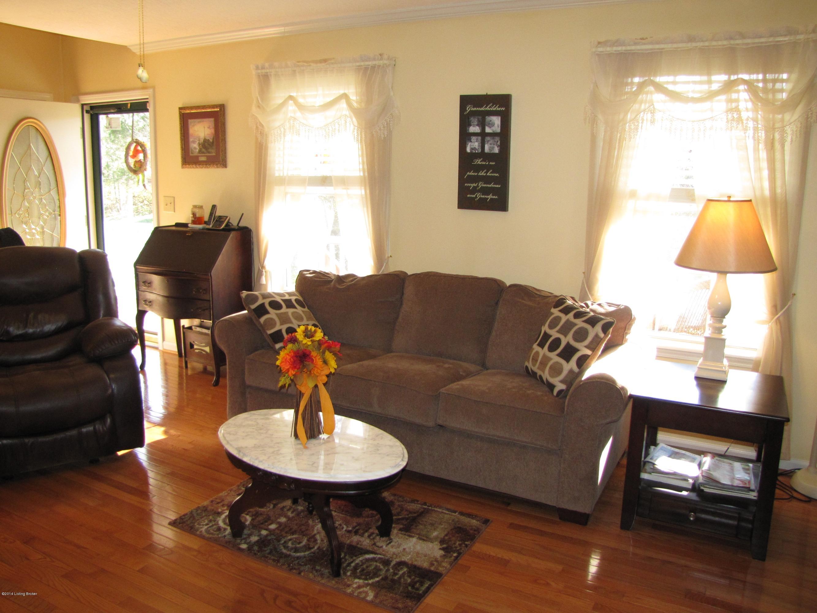 218 Fox Run Road Pendleton, KY 40055 - Photo 5 of 54 Welcome your guests through the front door into a cozy living room with cheerful neutral paint colors and large sunny windows.