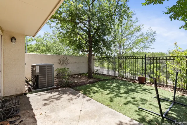 a view of a backyard with plants