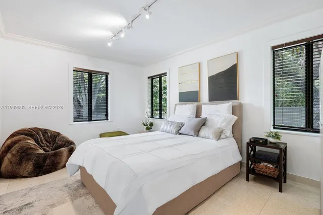 a view of a house with swimming pool and a yard