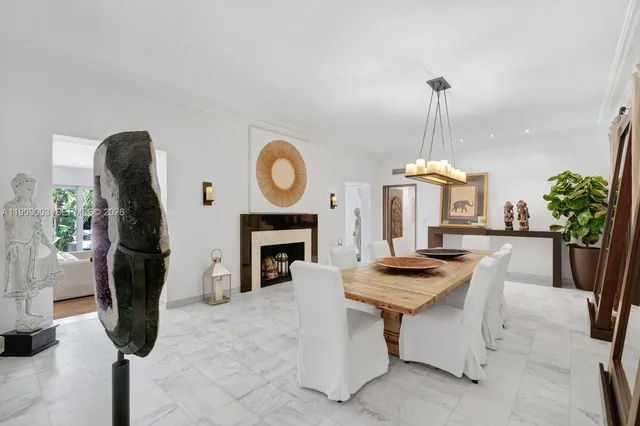 a bed room with a bed and a view of balcony
