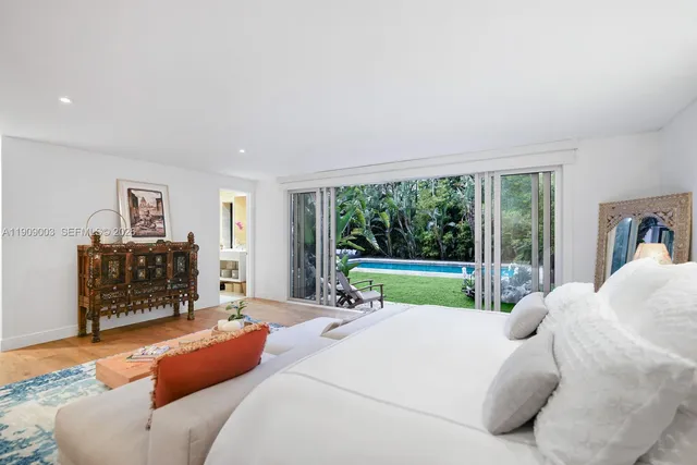 a room with furniture and a book shelf