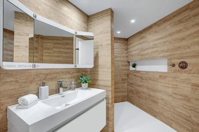 a view of backyard with seating area and green space