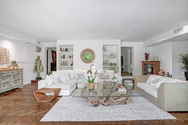 a large kitchen with a table and chairs