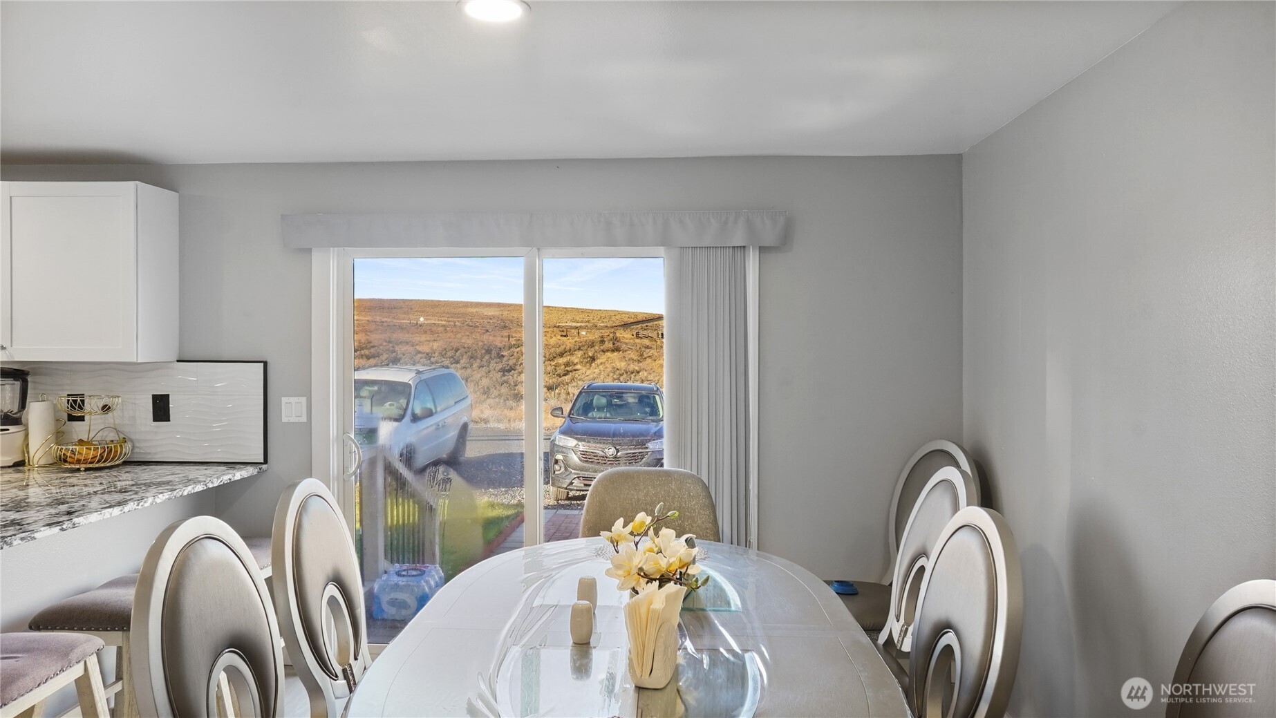 35 Hampton Road Othello, WA 99344 - Photo 22 of 33 a view of a dining room with furniture and a window
