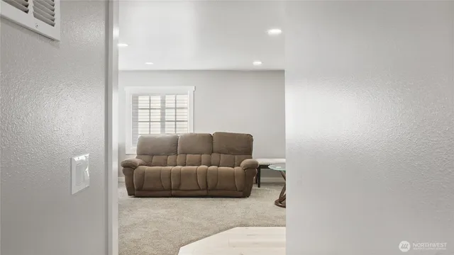 a living room with furniture or fireplace and a flat screen tv