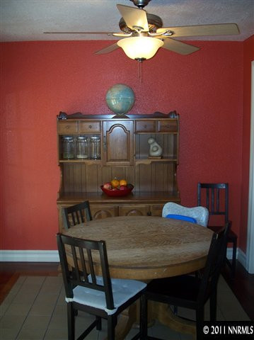 1960 Lassen Drive Reno, NV 89503 - Photo 2 of 13 a view of a dining room with furniture and chandelier