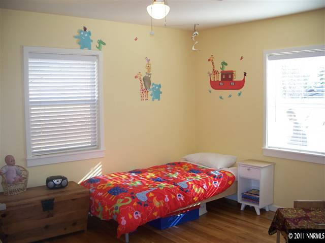 1960 Lassen Drive Reno, NV 89503 - Photo 9 of 13 a bedroom with a bed and a window