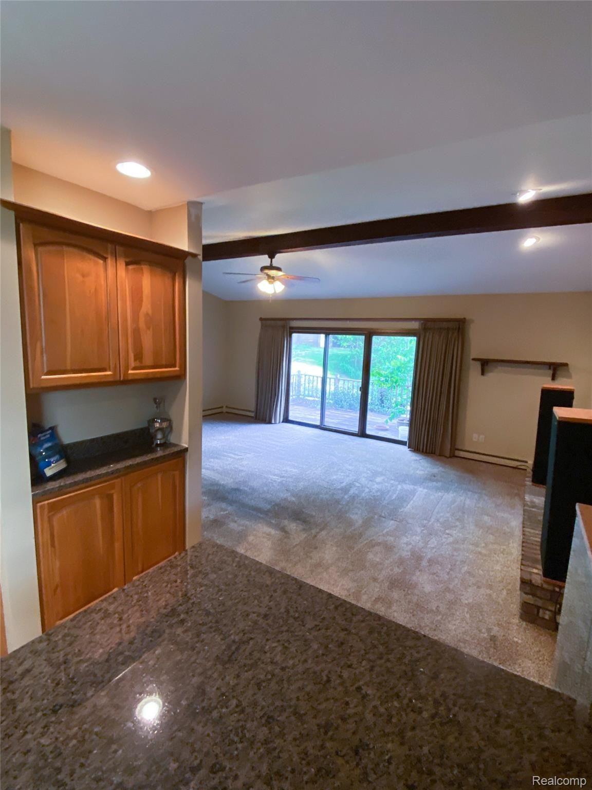 10476 Horton Road Goodrich, MI 48438 - Photo 12 of 19 Coffee/drink bar adjacent living room and kitchen