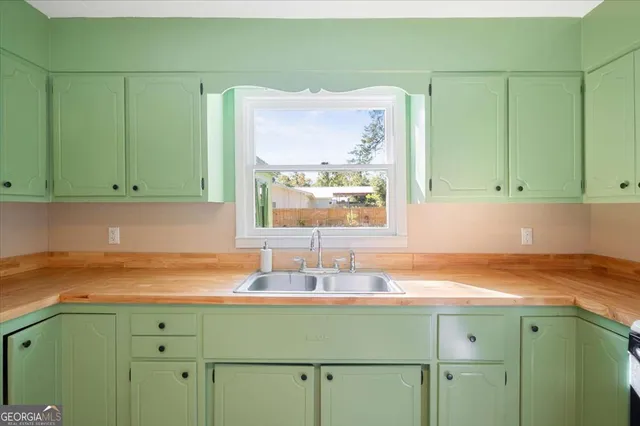 a view of a livingroom with furniture and window