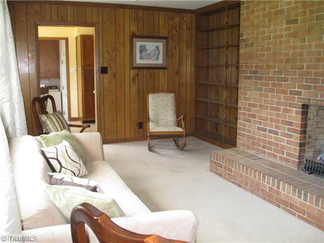 3734 Fieldview Road Pleasant Garden, NC 27313 - Photo 13 of 16 Den/Family/Great Room. Opposite view of the den showing the impressive masonry fireplace and built-ins.