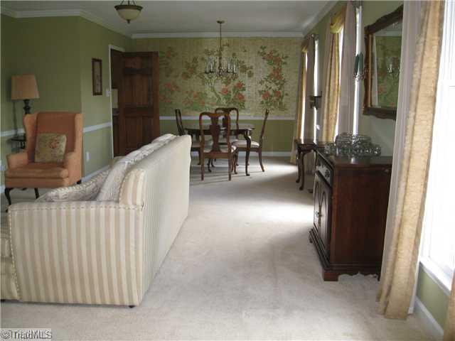 3734 Fieldview Road Pleasant Garden, NC 27313 - Photo 16 of 16 Living Room. View from the foyer, showing how open this sunlit floor plan truly is.