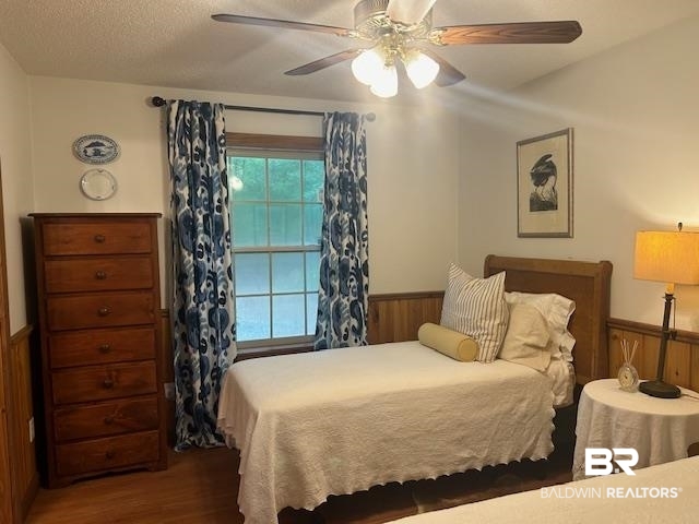 465 Rock Creek Road Wing, AL 36483 - Photo 9 of 15 Bedroom with a textured ceiling, ceiling fan, and hardwood / wood-style floors