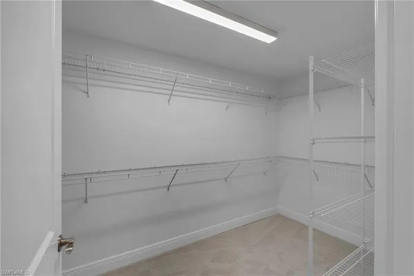 a view of a room with racks on the wall