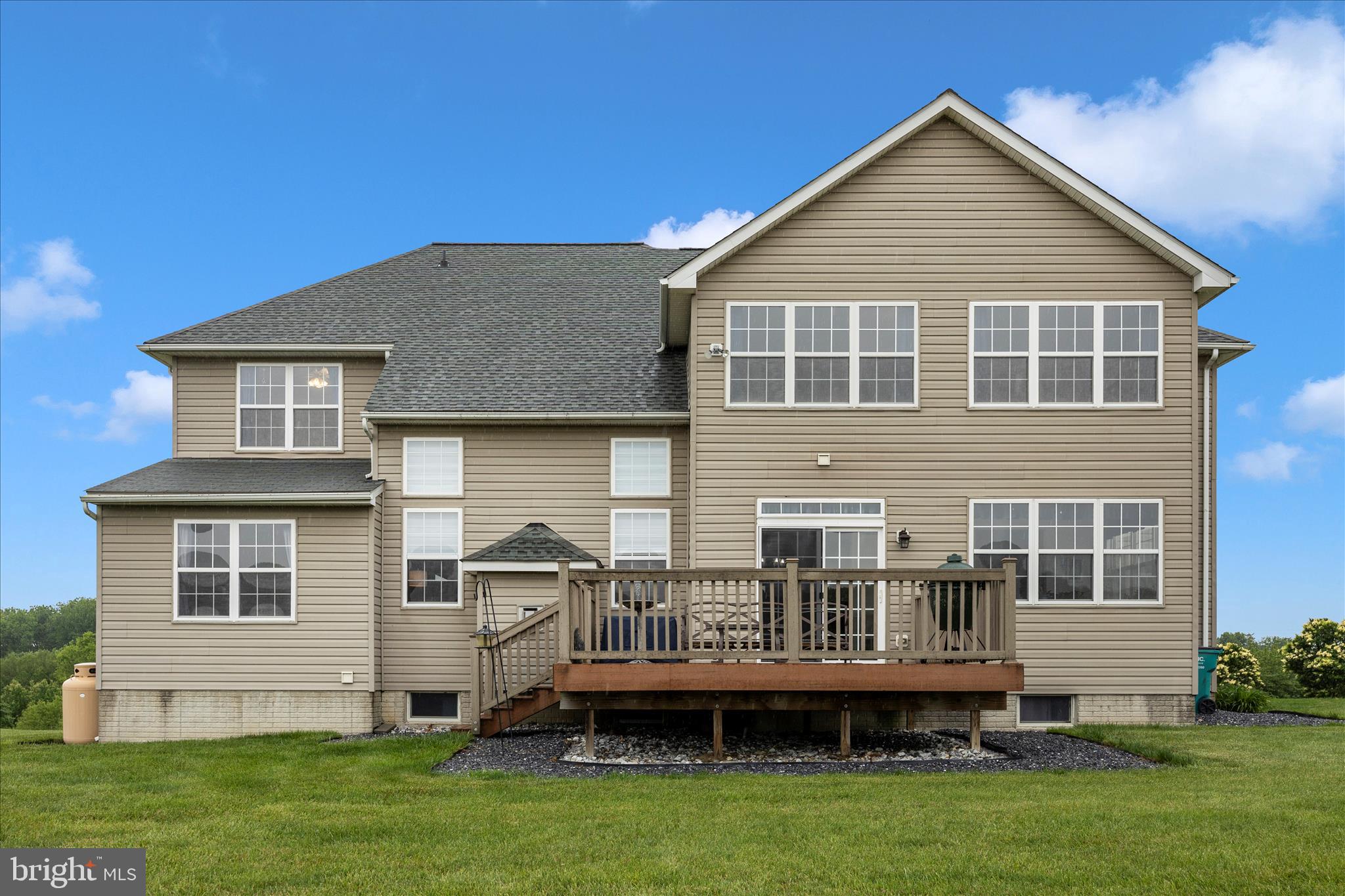 9855 McKinstry Mill Road New Windsor, MD 21776 - Photo 50 of 76 a front view of a house with a yard