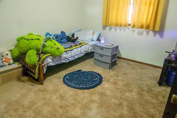 a room with toys and a table