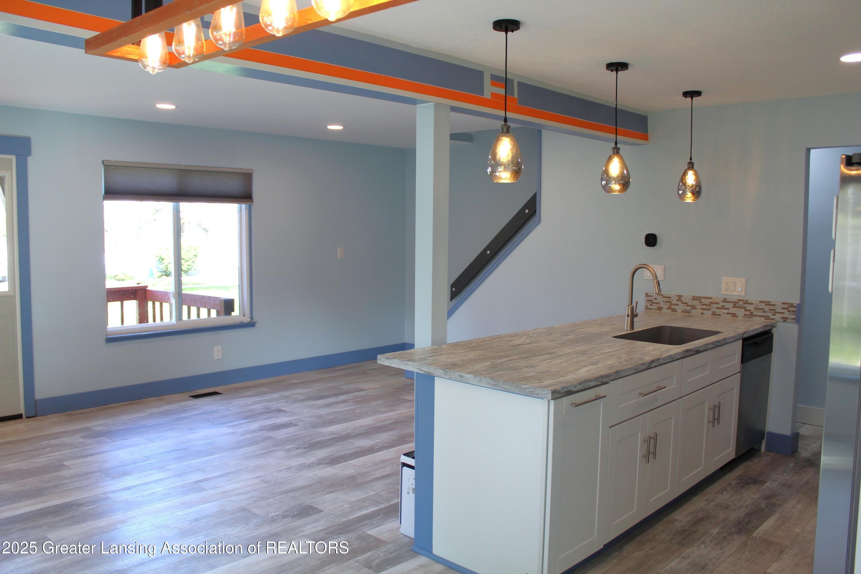 3922 Hunters Ridge Drive, Unit 3 Lansing, MI 48911 - Photo 3 of 44 GREAT ROOM