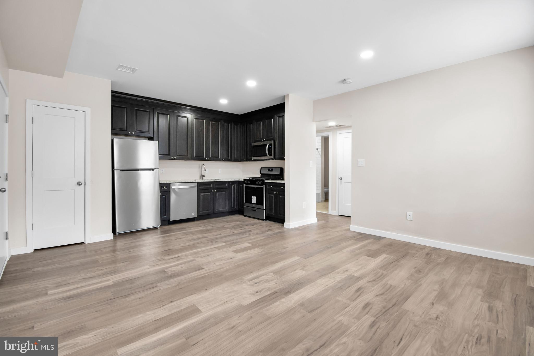202 Foundry Street Florence, NJ 08518 - Photo 13 of 22 a view of kitchen with refrigerator and microwave