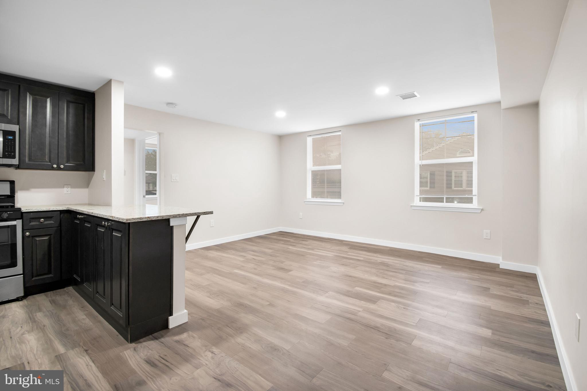 202 Foundry Street Florence, NJ 08518 - Photo 22 of 22 a view of kitchen with granite countertop cabinets and wooden floor