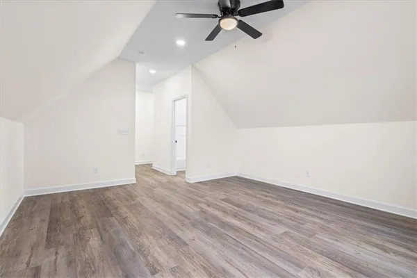 a bathroom with a toilet a sink and bathtub