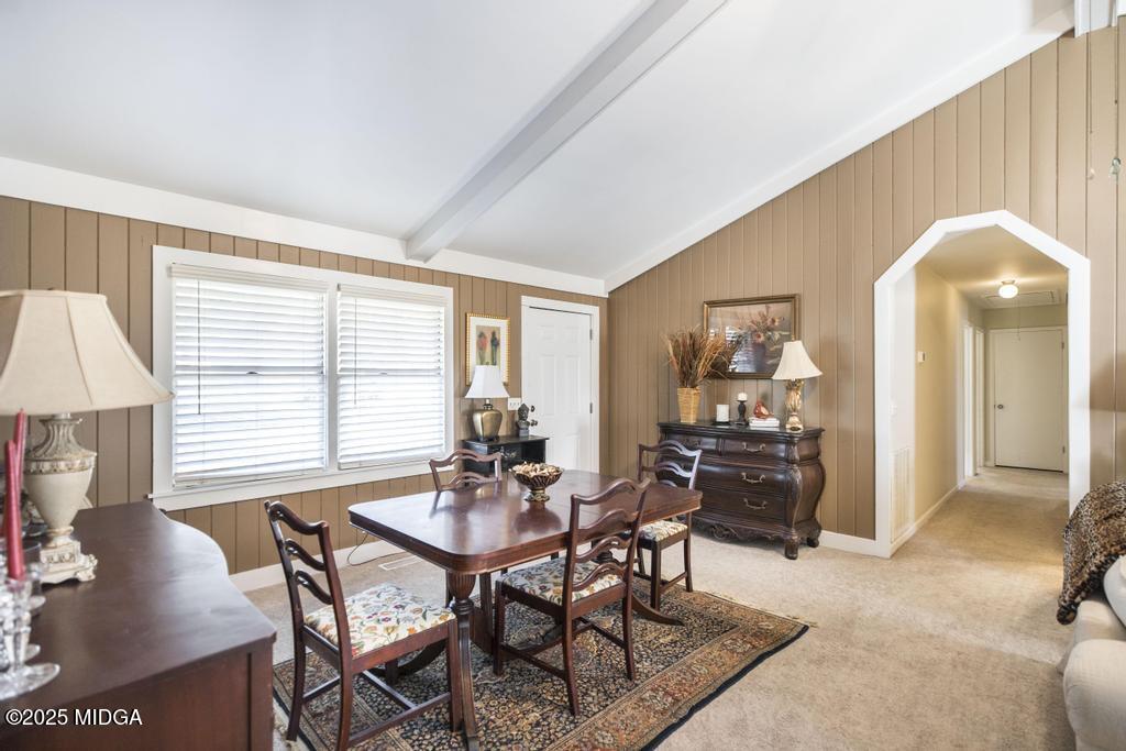 559 Stone Edge Road Macon, GA 31210 - Photo 11 of 40 a view of a livingroom with furniture and window