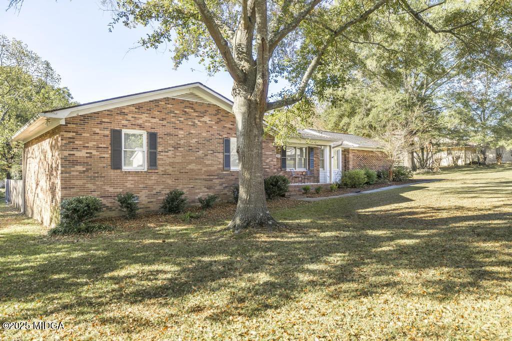 559 Stone Edge Road Macon, GA 31210 - Photo 3 of 40 a view of a house with a yard