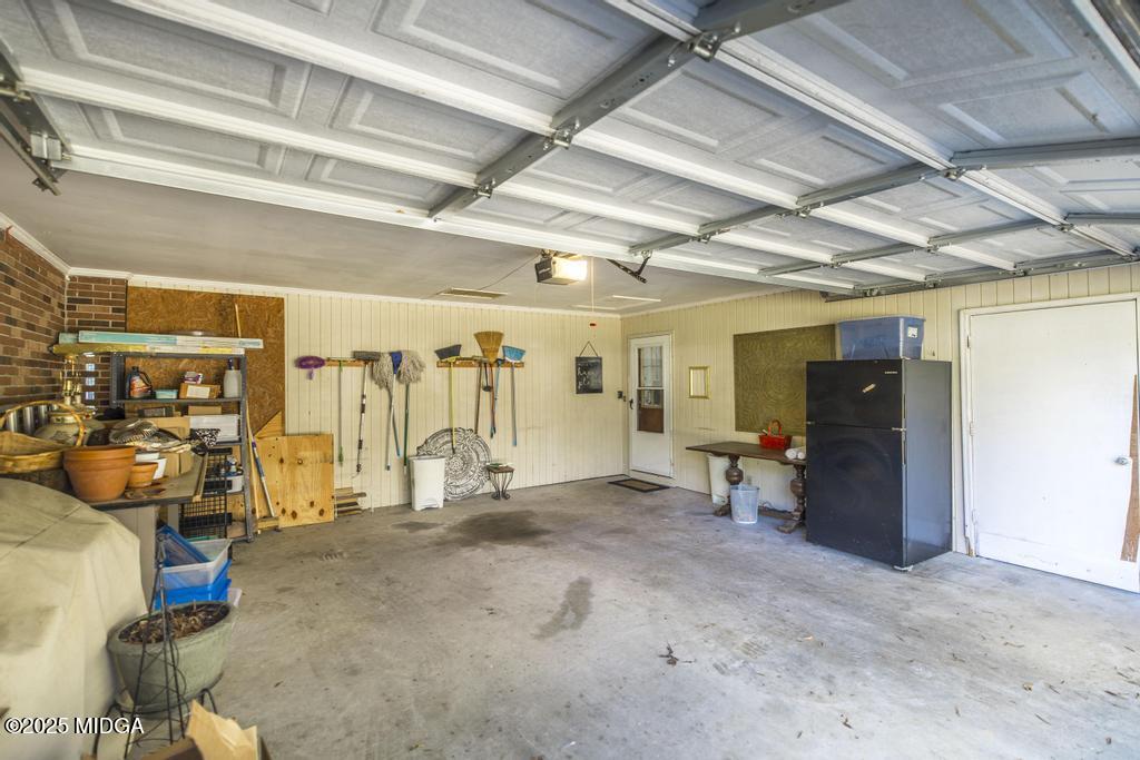 559 Stone Edge Road Macon, GA 31210 - Photo 32 of 40 a view of a room with gym equipment