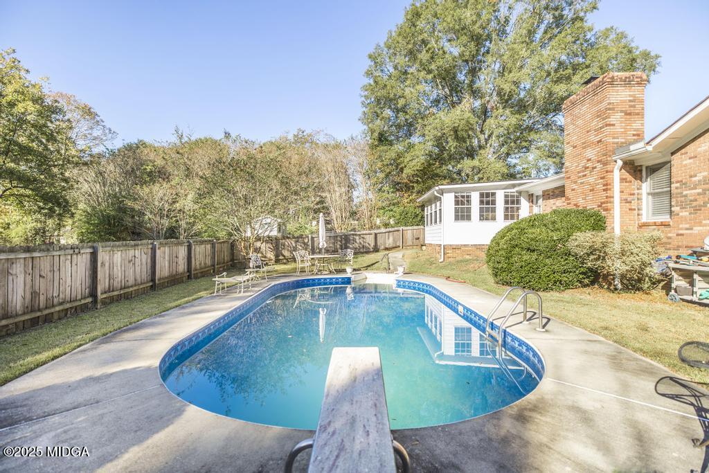 559 Stone Edge Road Macon, GA 31210 - Photo 36 of 40 a view of a swimming pool with a patio