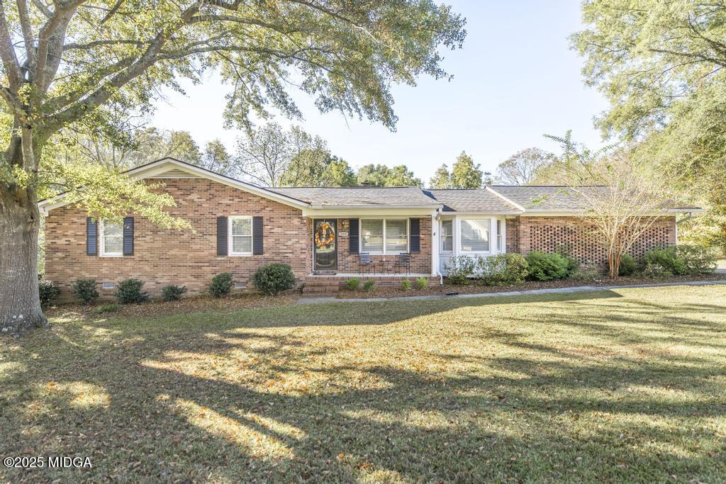 559 Stone Edge Road Macon, GA 31210 - Photo 4 of 40 a view of a yard in front of a house