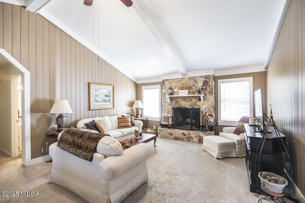 559 Stone Edge Road Macon, GA 31210 - Photo 8 of 40 a living room with furniture large window and a fireplace