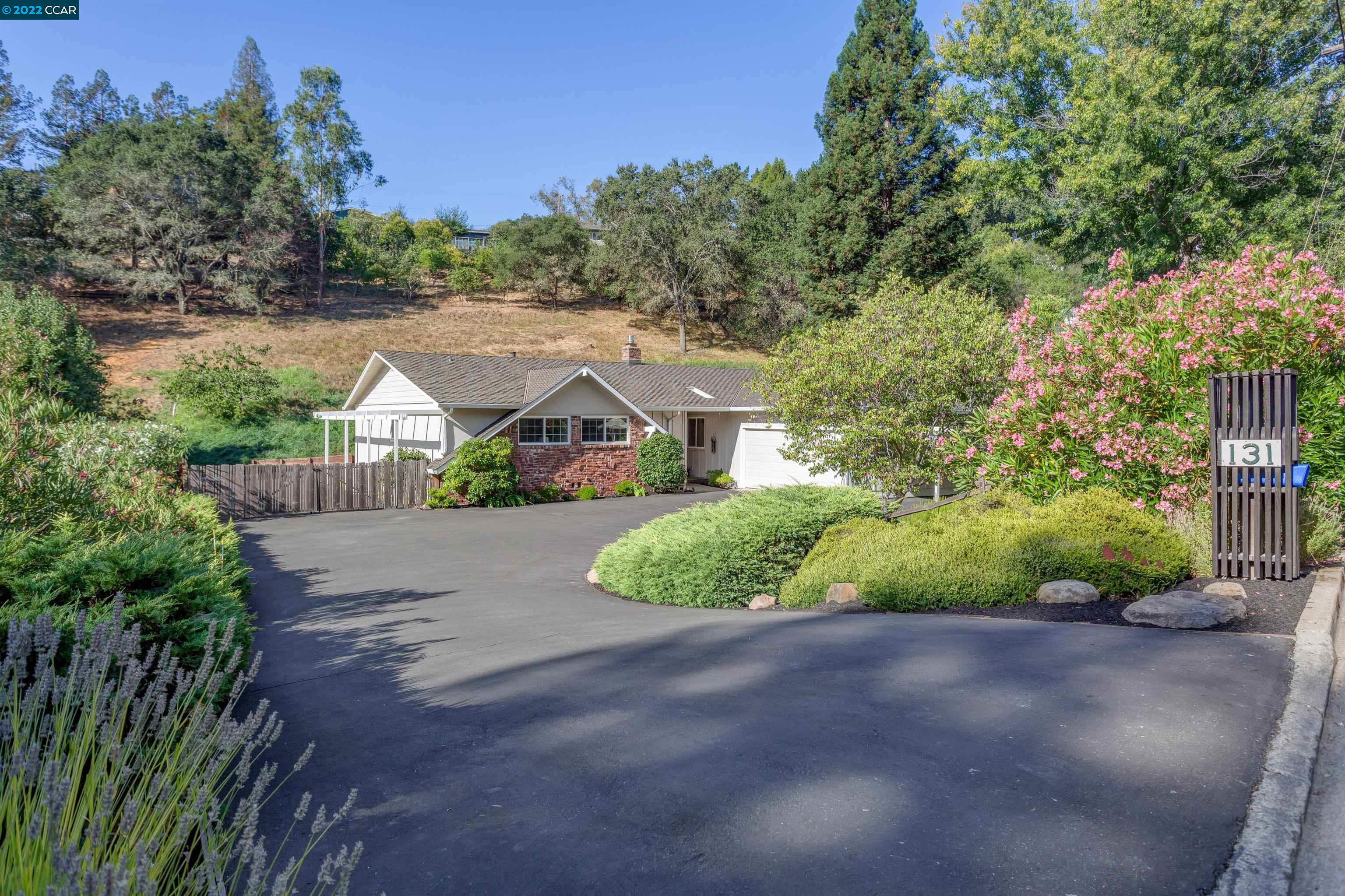131 Meadow View Road Orinda, CA 94563 - Photo 1 of 1 a view of green field with small trees