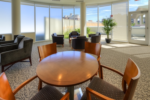 807 Davis Street, Unit 1607 Evanston, IL 60201 - Photo 23 of 28 a view of a dining room with furniture window and outside view