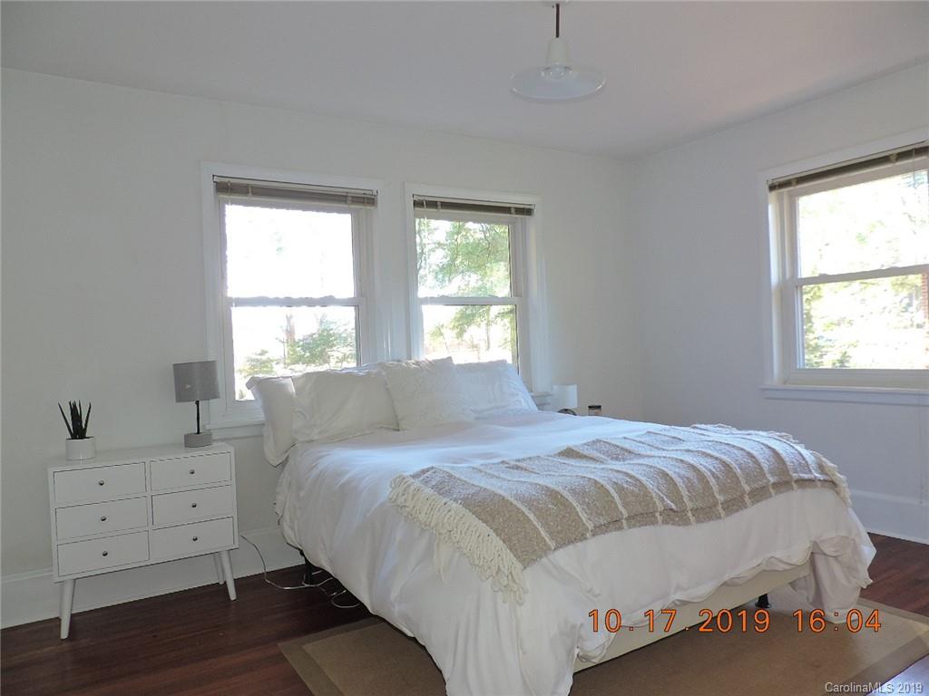 5908 Tuckaseegee Road Charlotte, NC 28208 - Photo 13 of 30 a bedroom with a bed and a window